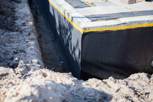 Professional Waterproofing technician working in Elkton, TN